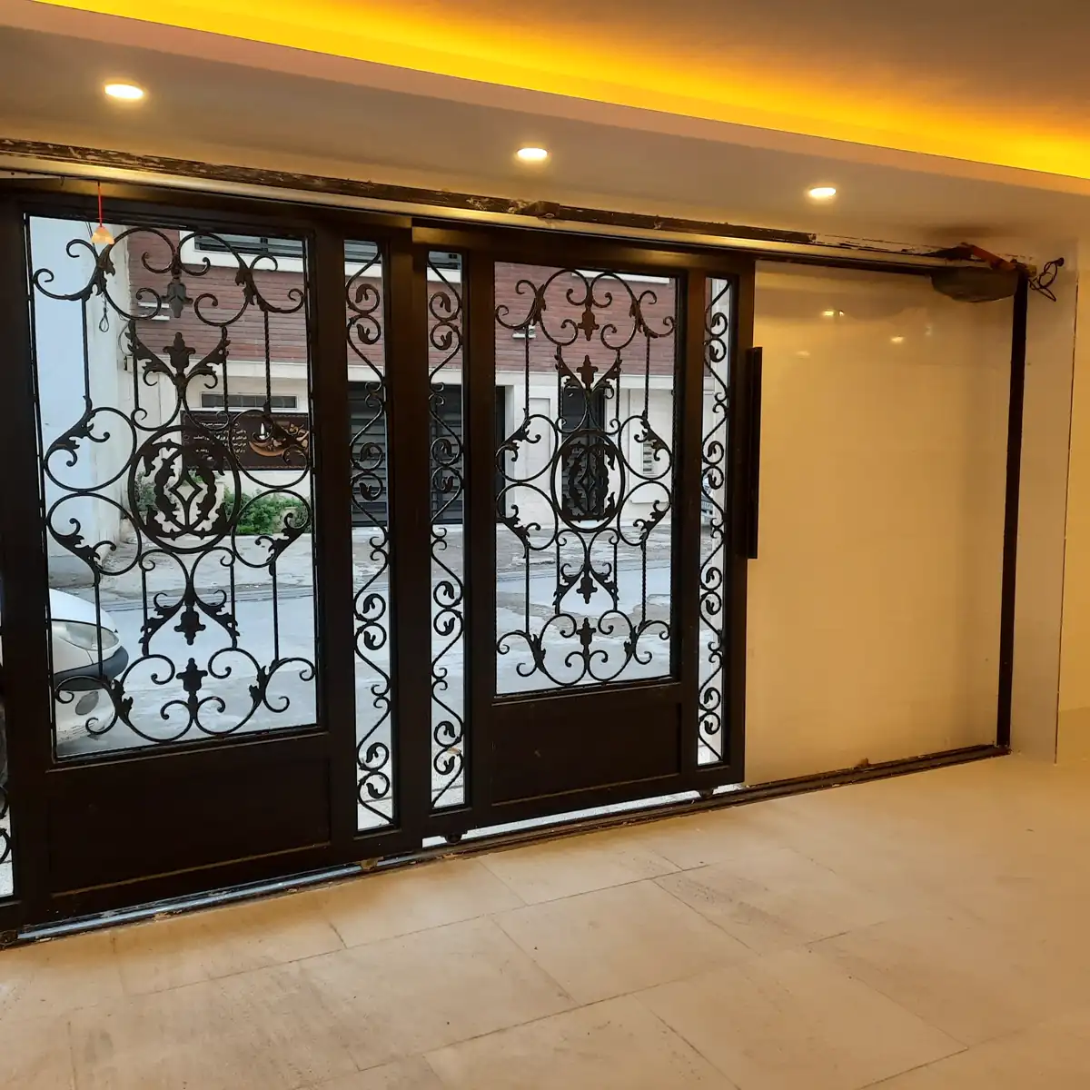 اتوماسیون درب ریلی پارکینگ با جک برقی